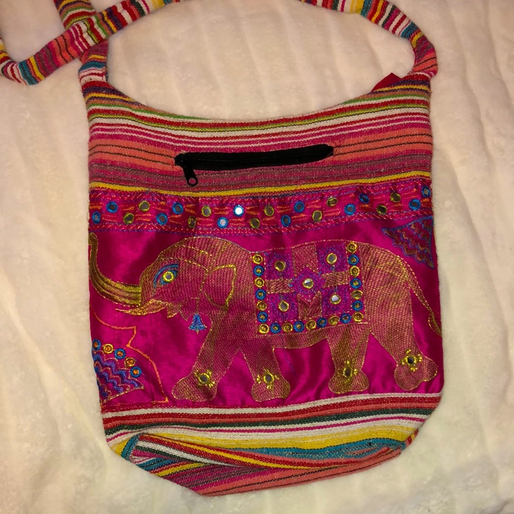 Shoulder bag with embroidered elephant decal